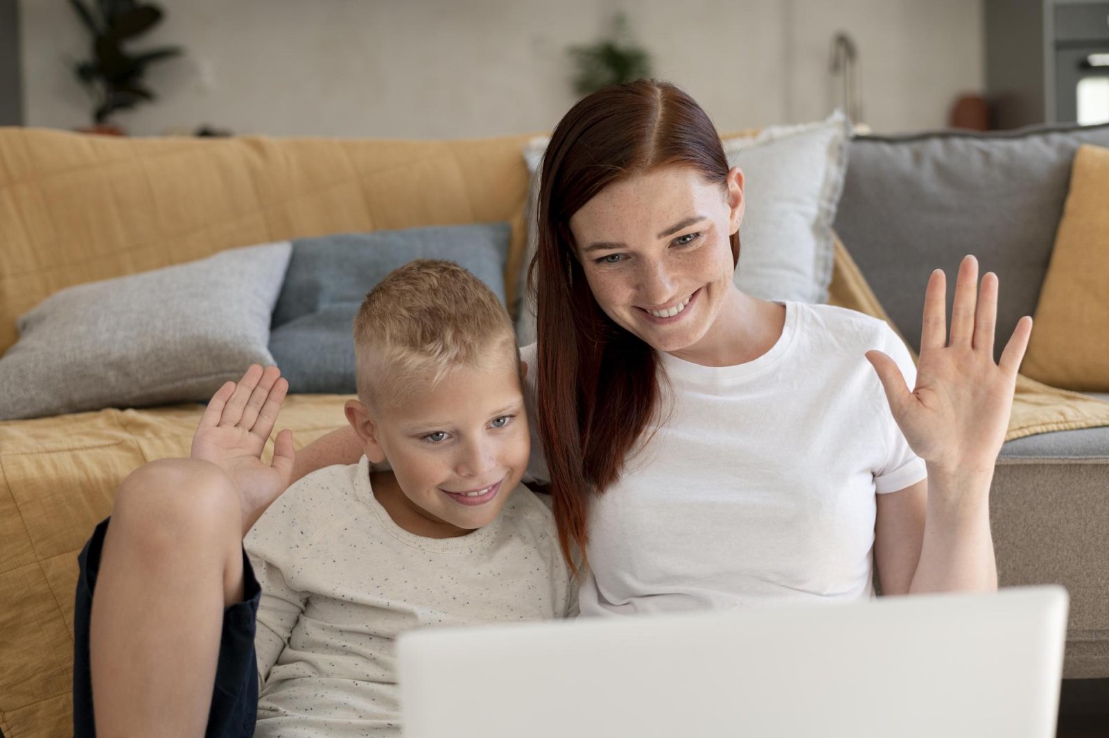 A parent and child on a video call